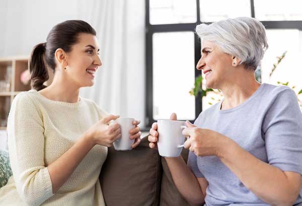 Two women smiling